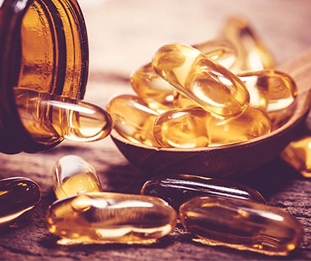 Yellow supplement capsules